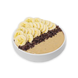 Sliced Bananas, Almonds Butter, and Cacao in a white bowl