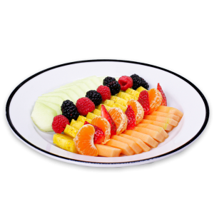 Melon, Oranges, Berries, and Pineapple sliced on a white plate
