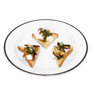Ricotta and Mushroom Tartine on white plate