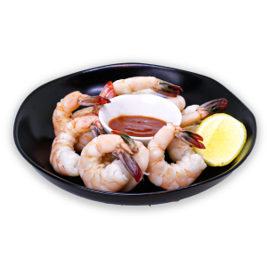 Shrimp Cocktail in a black bowl with lemon